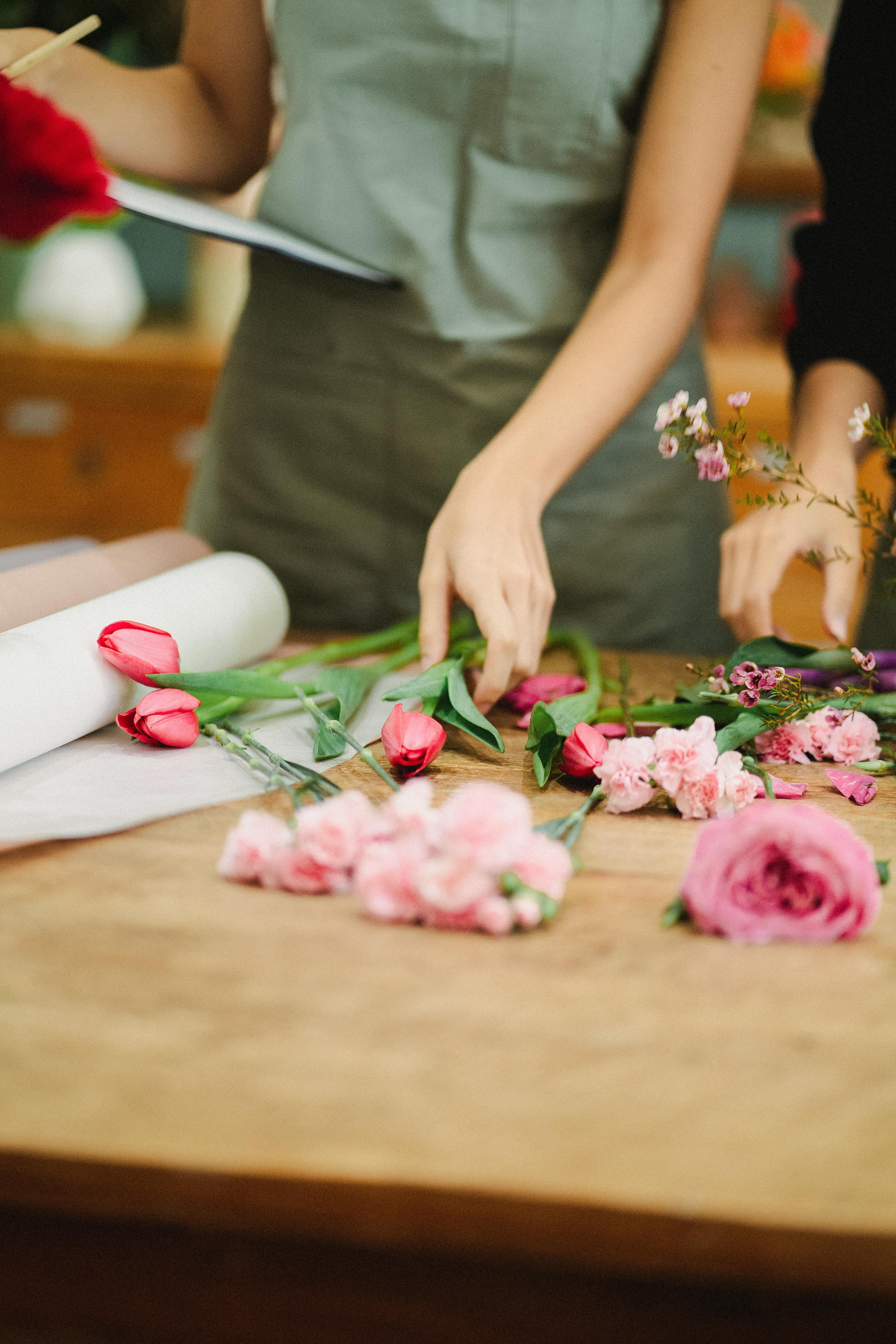 crop florists making floral arrangement