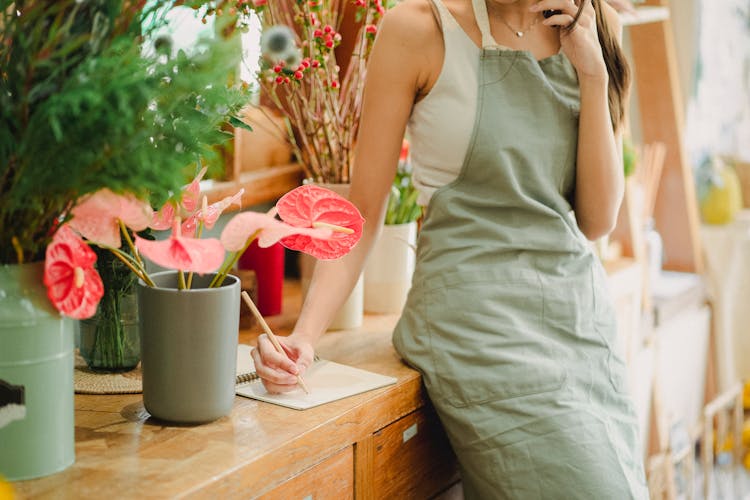 Crop Woman Working In Floral Shop