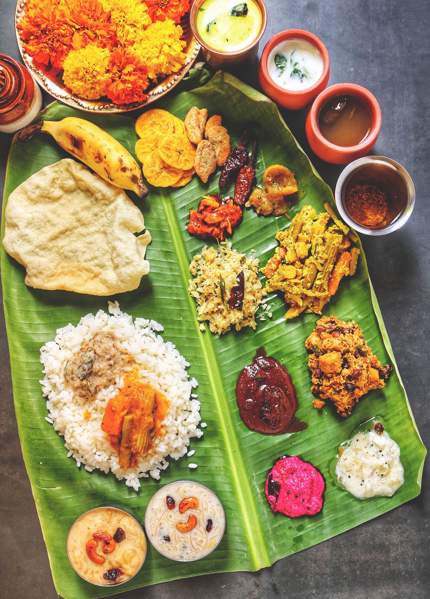 A sadya served on a banana leaf