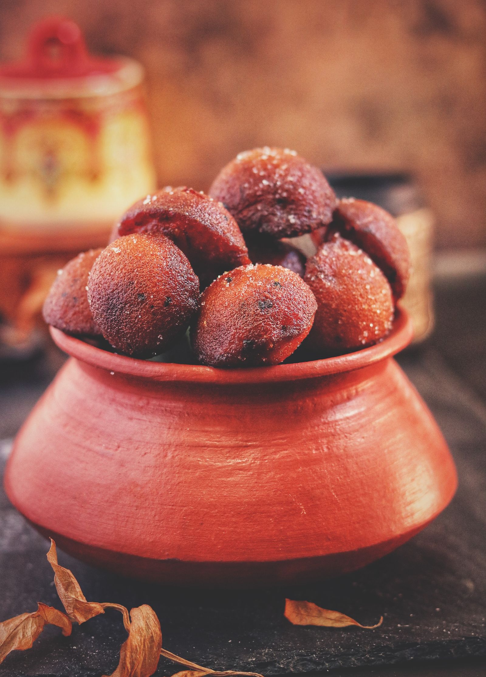Food served in a rustic clay pot