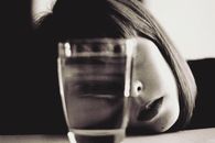 Womans Face in Grayscale Photography