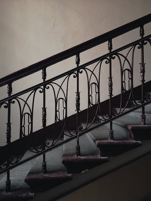 Free Black Metal Railings on Concrete Stairs Stock Photo