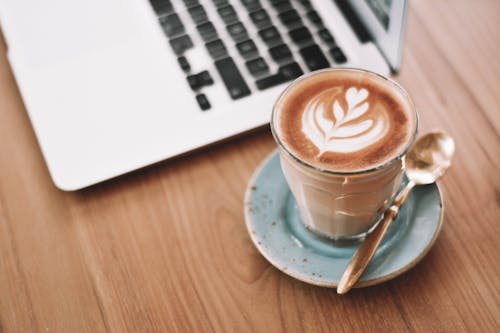 Coffee with Latte Art in Clear Glass