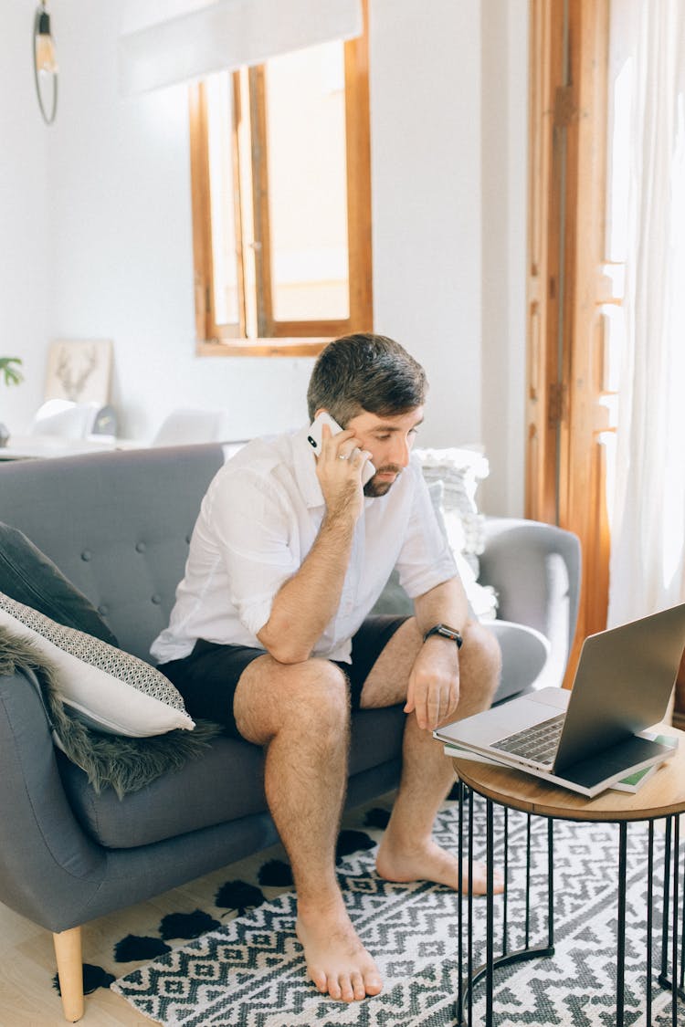 A Man Talking On The Phone