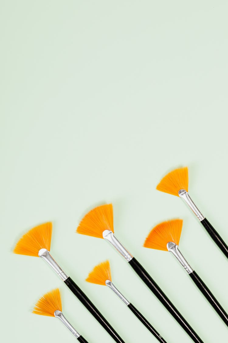 Paintbrushes In Pattern Row