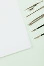 Compasses and Paper Sheet