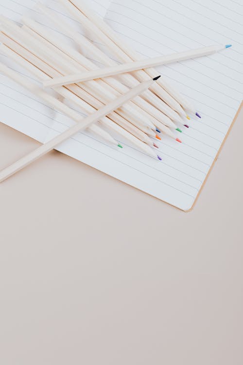 Free White Coloring Pencils on White Paper Stock Photo