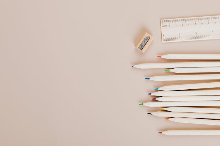 Colored Pencils, Wooden Ruler And 