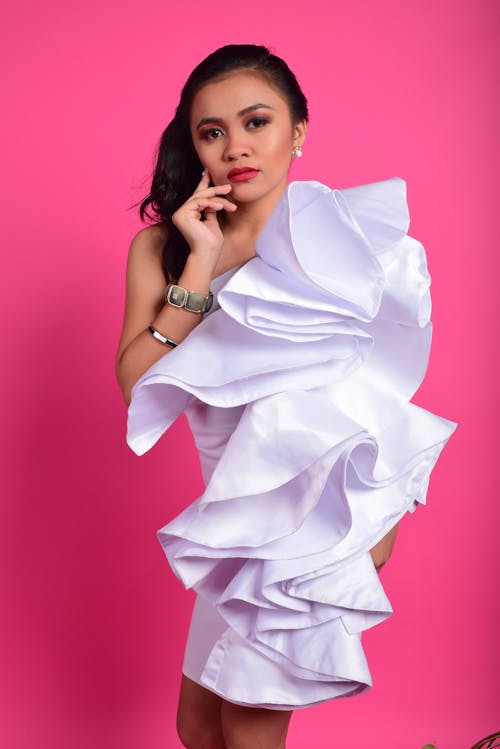 Free Fashionable ethnic woman in white dress Stock Photo