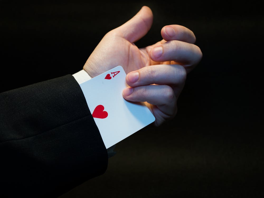 Free Person Holding Ace of Heart Playing Card Stock Photo
