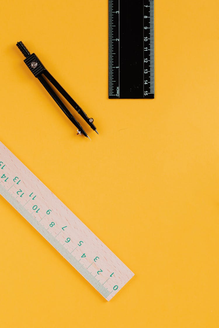 Measuring Tools On Yellow Background 