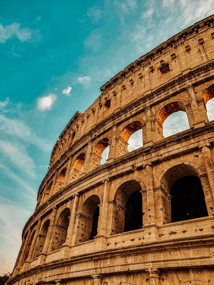 Famous Roman Ancient Amphitheater With Shabby Arches