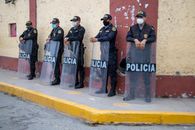 Police Holding Protector Shield