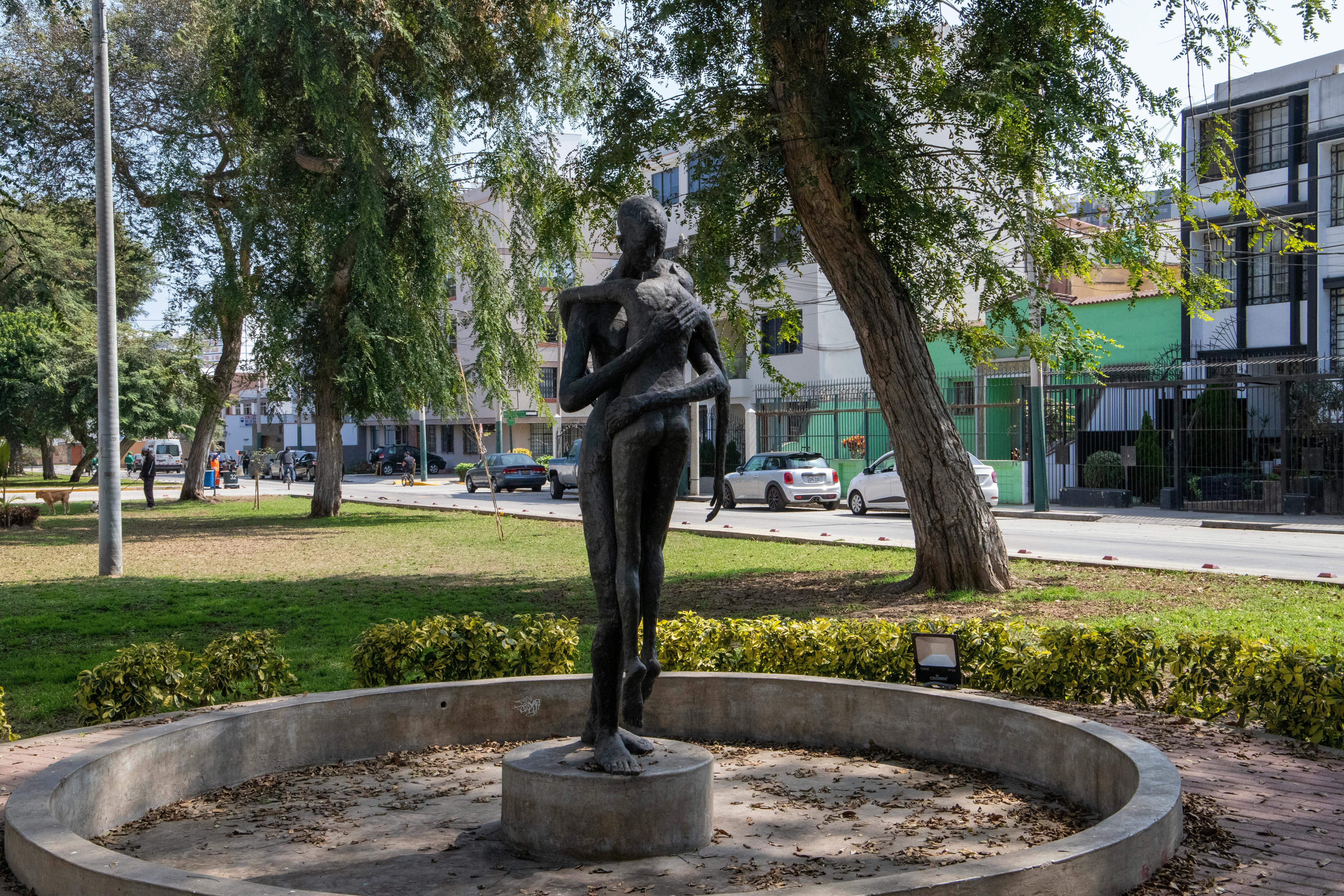 Image of a person holding a magnifying glass over a book, symbolizing the process of optimizing metadata for increased visibility and discoverability