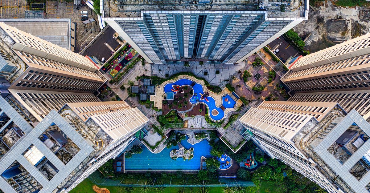 Bird's Eye View of High Rise Buildings with Swimming Pools · Free Stock ...
