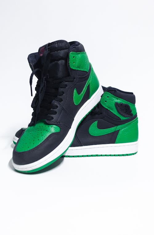 A Black and Green Nike Sneakers