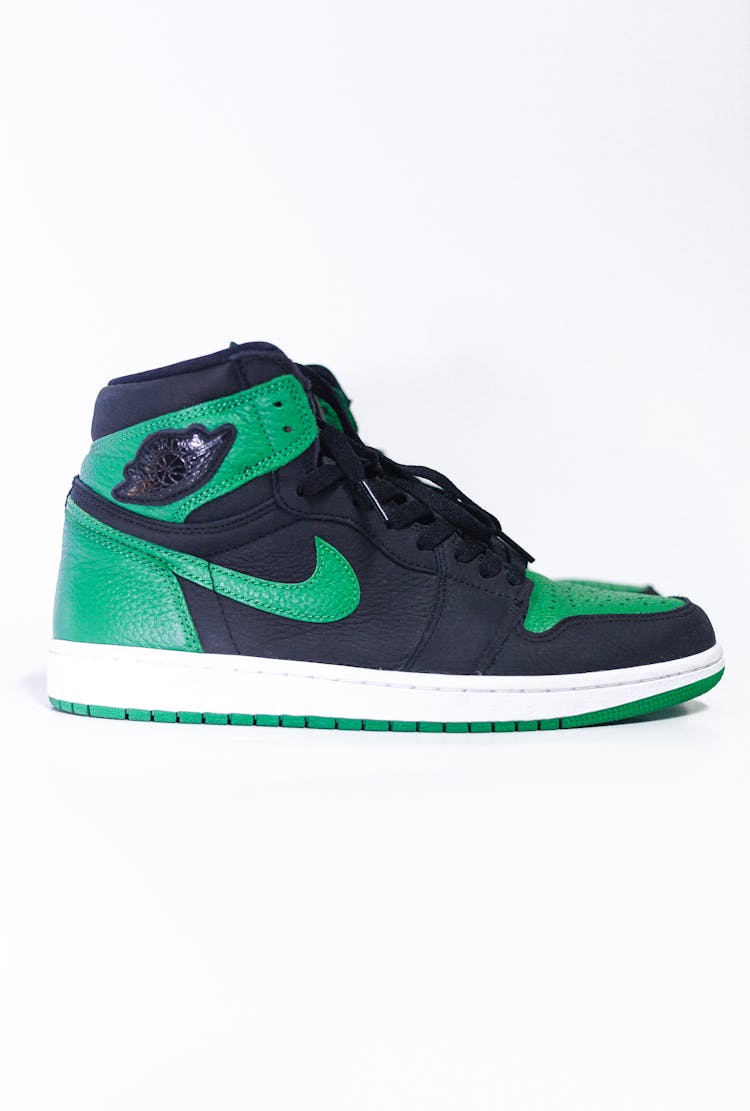 A Black And Green Jordan Nike Shoes