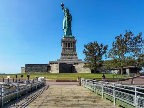 Free A view of the iconic Statue of Liberty on a clear day in New York City. Stock Photo