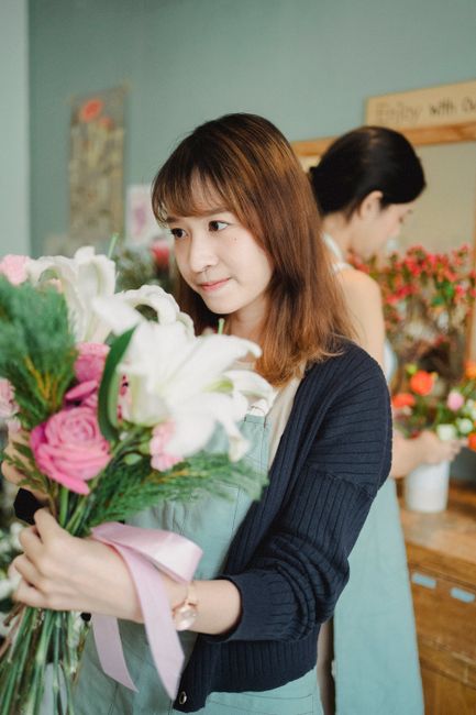 Florist creating a beautiful arrangement