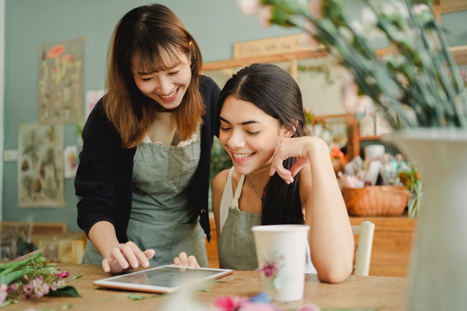 Business owner smiling at positive reviews on a tablet - deleting google reviews Business owner smiling at positive reviews on a tablet - deleting google reviews