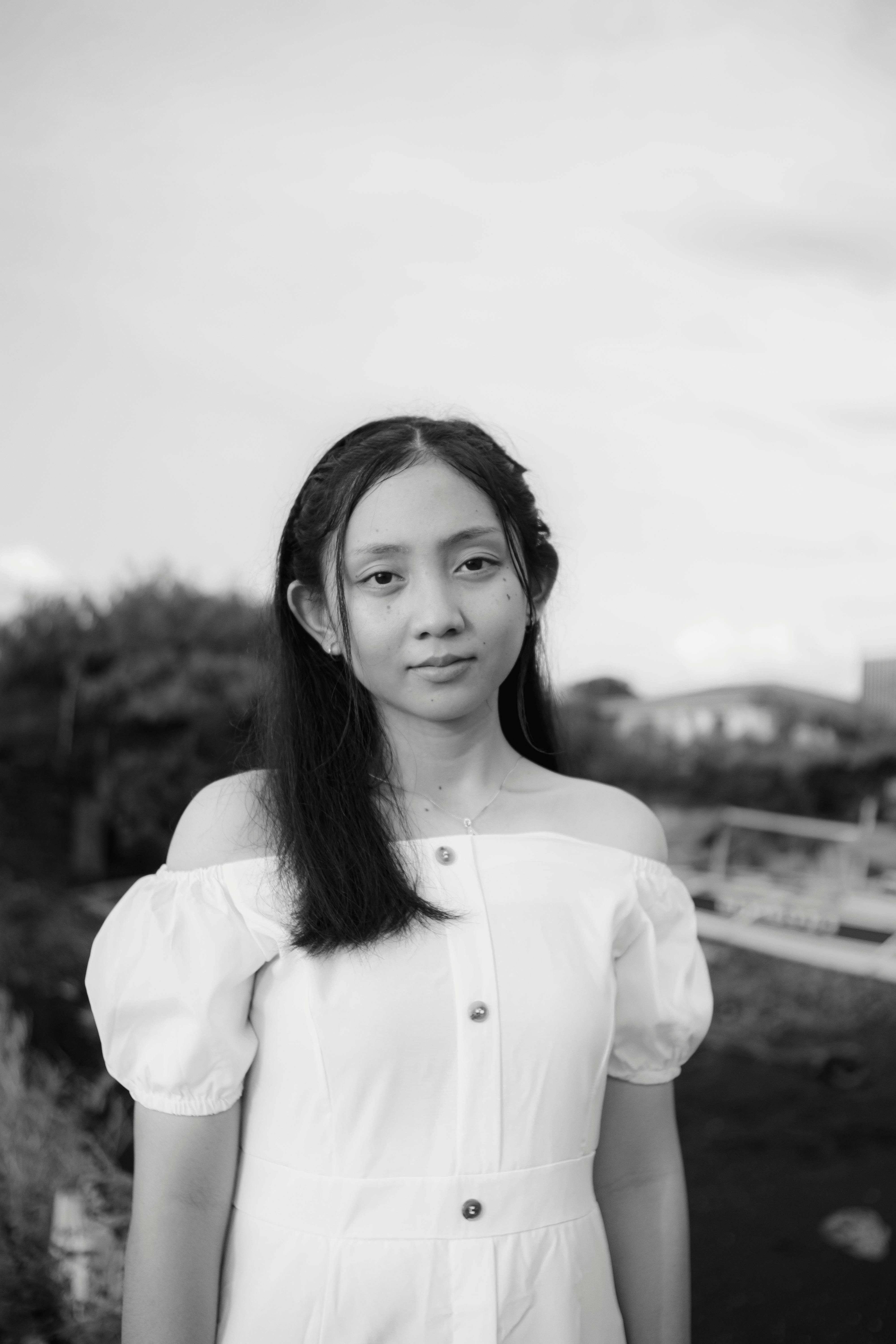 Portrait of a Beautiful Young Woman Wearing Nothing but White