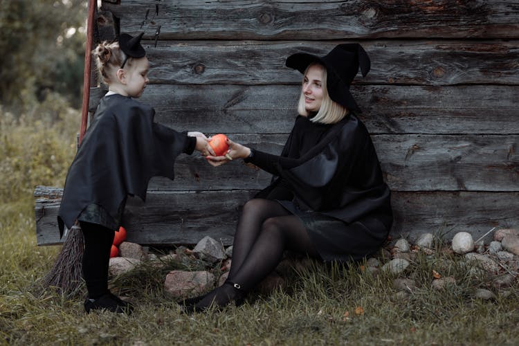 Mother And Child Wearing Halloween Costume