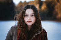 Portrait of a Pale Brunette Woman Outdoors in Winter 