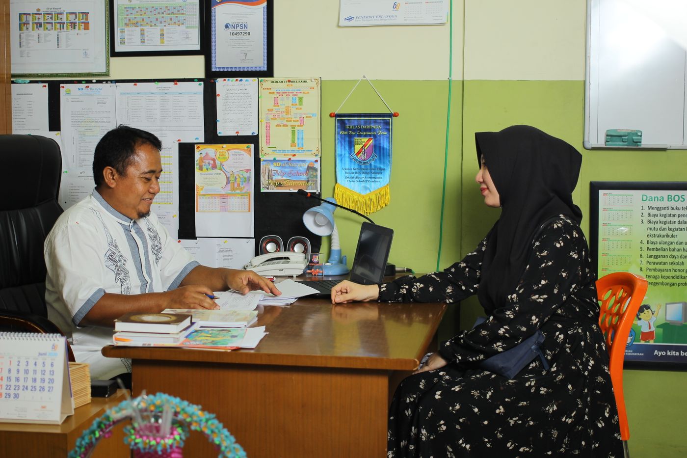 Parent meeting with school staff during admissions