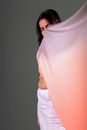 Woman in White Shirt Covering Her Face With White Textile