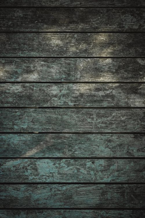Free Weathered wooden planks with a rustic, vintage appearance, perfect for backgrounds. Stock Photo