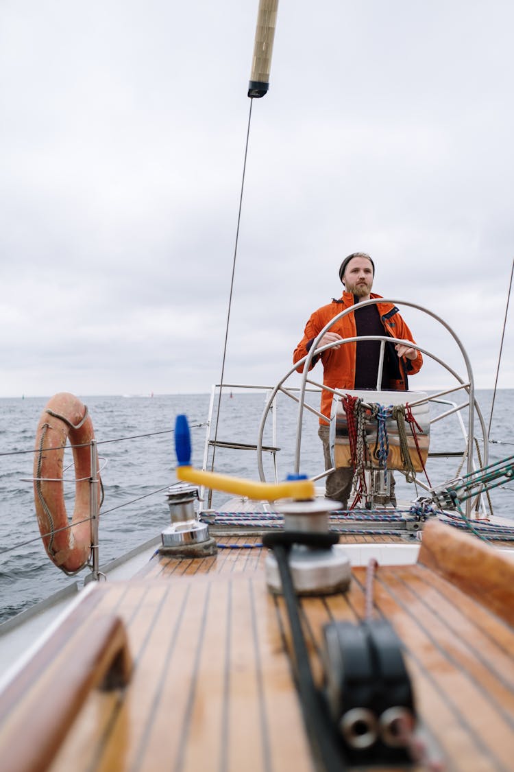 Man Driving A Boat