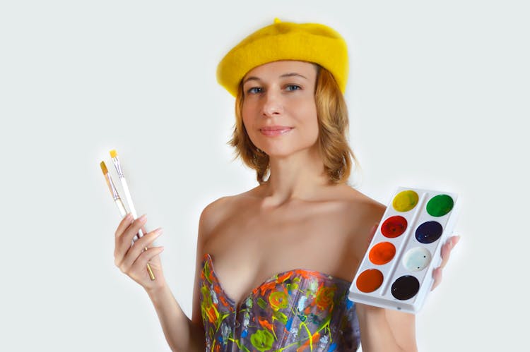 Smiling Woman With Brushes And Watercolor