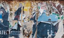 Torn Posters on Notice Board