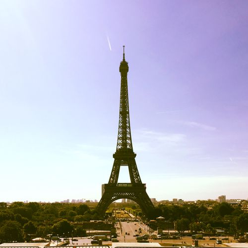 Free Stunning view of the Eiffel Tower against a clear blue sky in Paris, France. Stock Photo