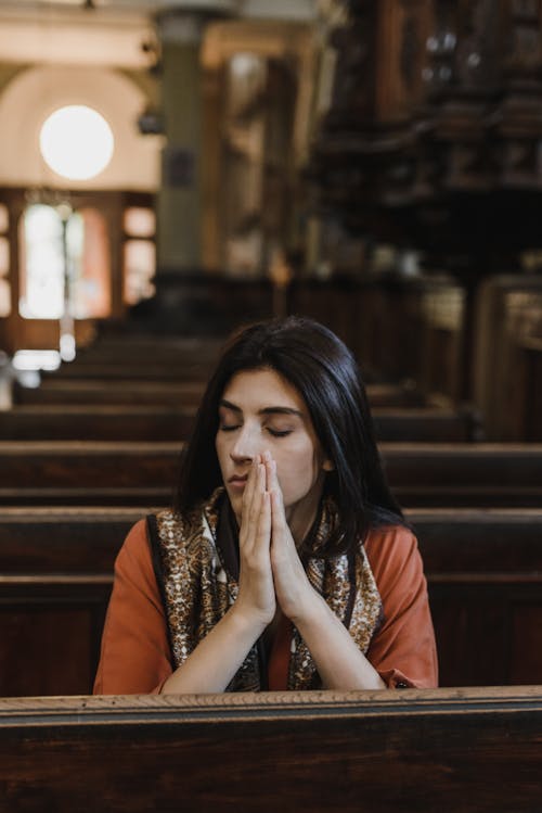 A Woman Praying in the Church