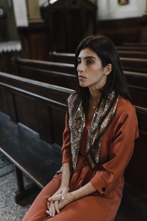 Woman Praying in Church