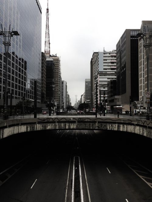 Free São Paulo skyline view of Paulista Avenue showcasing urban architecture and city life. Stock Photo