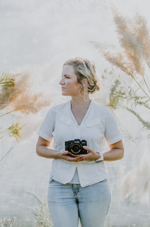 Woman Holding Camera