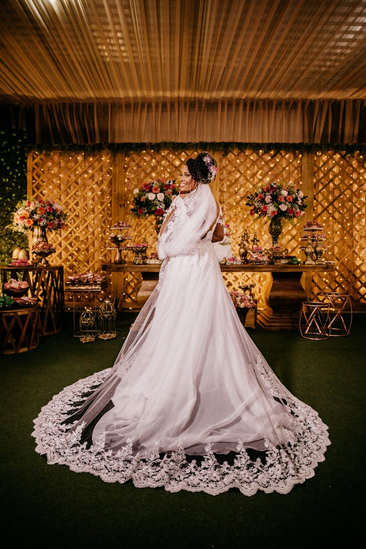 Elegant Woman In Wedding Dress Posing