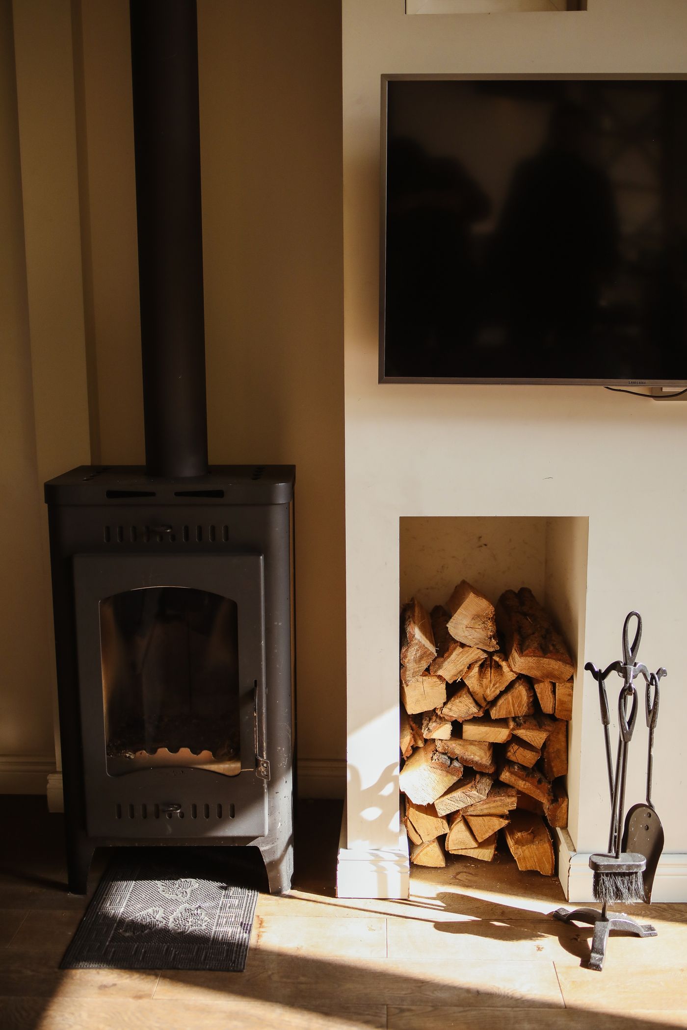 Wood burning stove in a finished fireplace