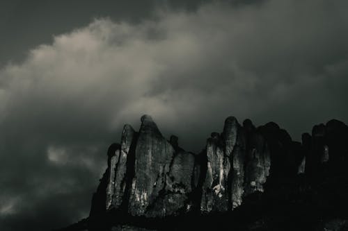 Gray Rock Formation Under Gray Clouds