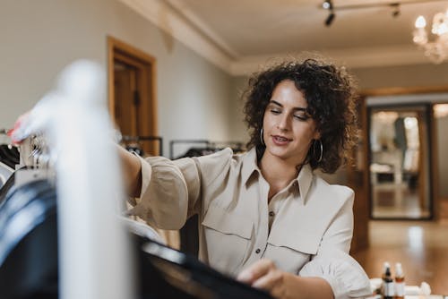 Free A Woman Shopping Alone in a Boutique  Stock Photo