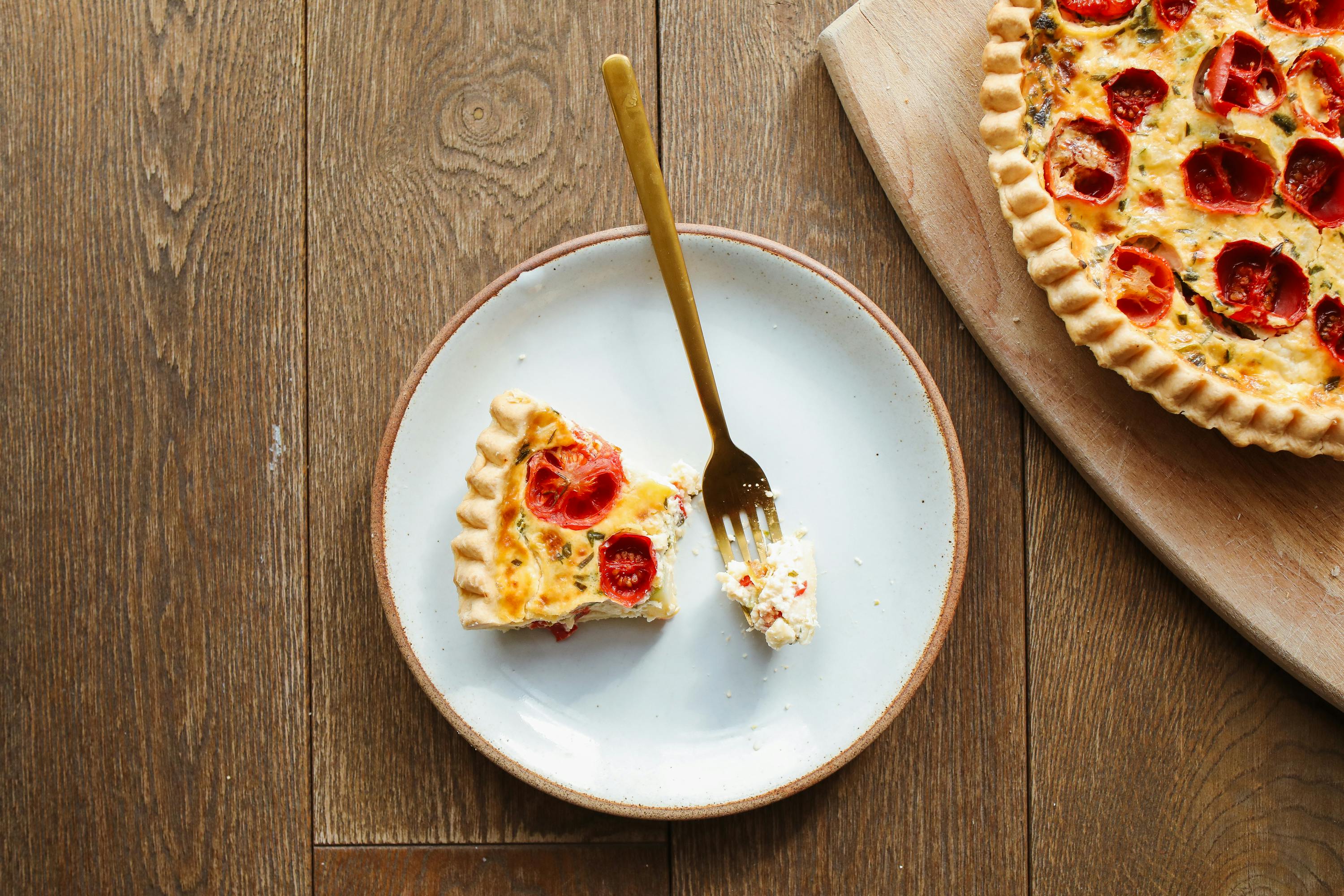 overhead shot of a slice of tomato pie