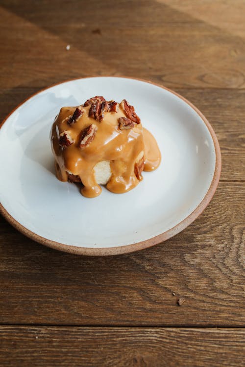 Pudding Cake with Toffee Icing and Sprinkled with Chopped Dates