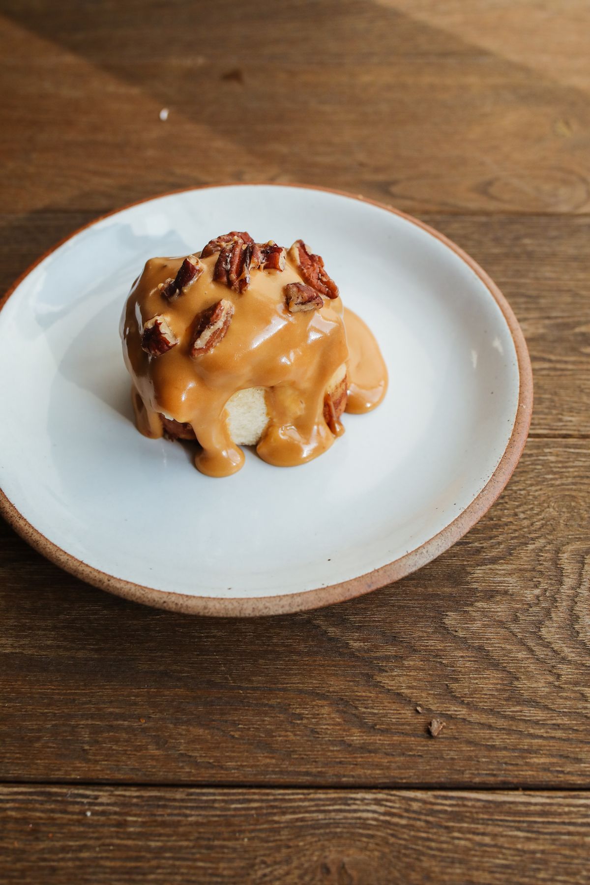 Dessert with pecan topping and toffee icing