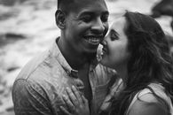 Man and Woman Smiling in Grayscale Photography