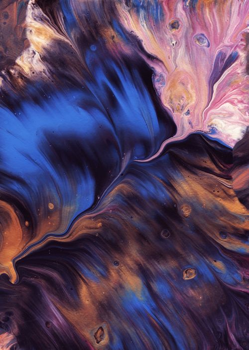 Free Dynamic abstract fluid art featuring bold blue and gold swirls in a vertical composition. Stock Photo