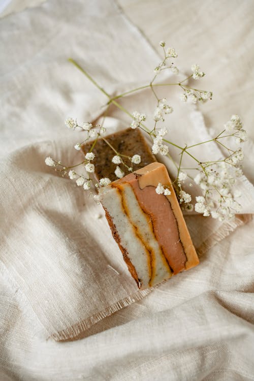 Free Baby's Breath Flowers on Brown Bar Soaps  Stock Photo