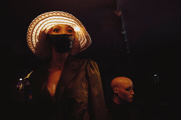 Mannequin In Hat And Mask In Dark Warehouse