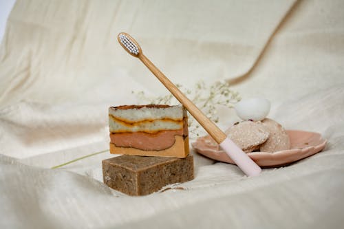 Free A Wooden Toothbrush on Bar Soaps Stock Photo